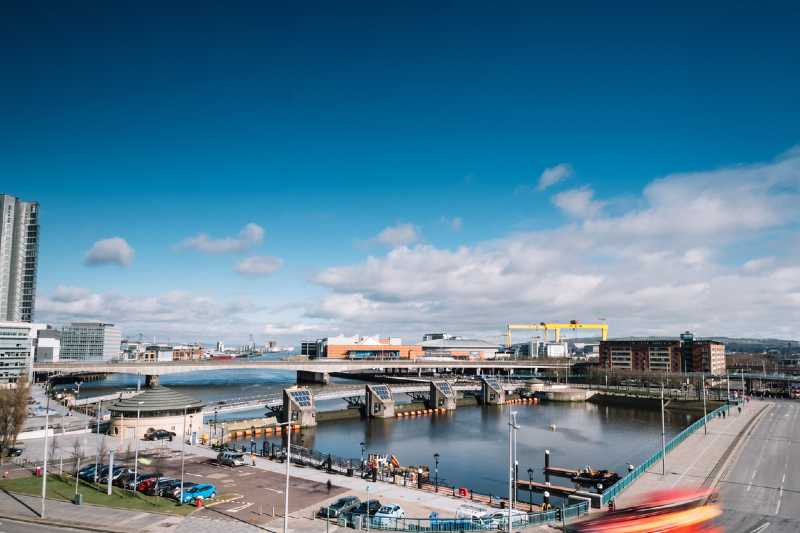 Belfast harbour, buildings, water and yellow cranes